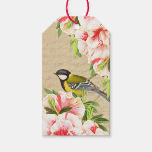 Vintages Geschenk etikettiert mit Vogel und rosa Geschenkanhänger