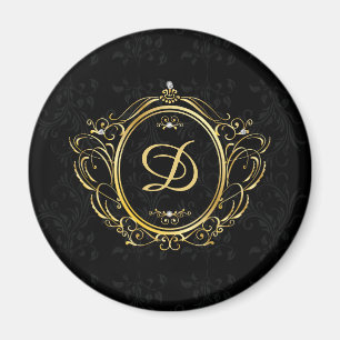 Vintages, goldfarbenes Monogramm mit schwarzem Dam Magnet