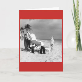 Vintages Kind mit Santa on Beach Card Feiertagskarte