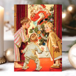 Vintages Mama Küssen Weihnachten<br><div class="desc">Vintage Weihnachtskarte Mommy Kissing Weihnachtsmann. Dieses lustige Design zeigt drei Kinder, die Mama beim Küssen des Weihnachtsmanns erwischt haben. Was für eine schöne Retro-Urlaubsszene! Personalisieren Sie dieses maßgeschneiderte Design mit Ihrem eigenen Gruß.</div>