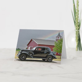 Vintages schwarzes Auto mit Regenbogen Karte
