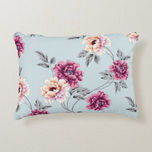 violette und gelbe Blumen mit Blätter auf b Dekokissen
