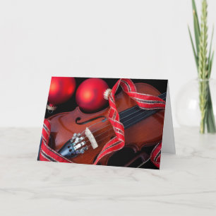 Violine und rote Weihnachtsverzierungen Feiertagskarte