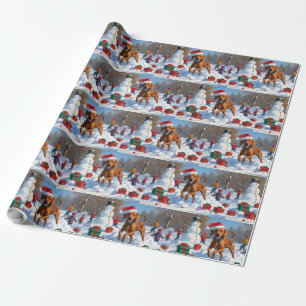Vizsla läuft im Schnee mit Weihnachtsmütze Geschenkpapier
