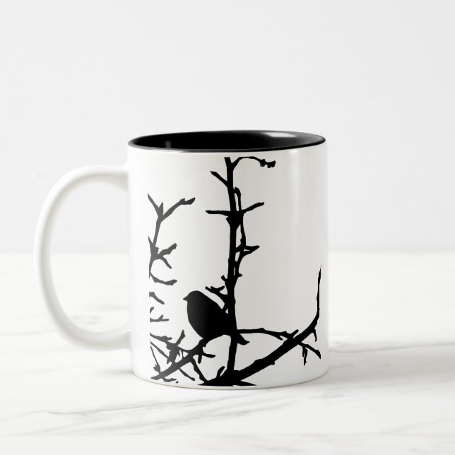 Vogel an einer Zweigstelle Zweifarbige Tasse (Links)