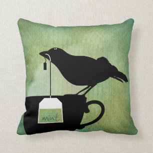 Vogel auf einem Teacup-Kissen Kissen