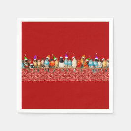 Vögel, die Weihnachtsmannmützen tragen Serviette