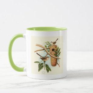 Vogel-Paare auf einem Nest gehockt auf einer Tasse