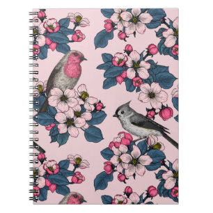 Vögel und Blüten auf rosa Notizblock