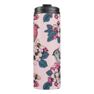 Vögel und Blüten auf rosa Thermosbecher