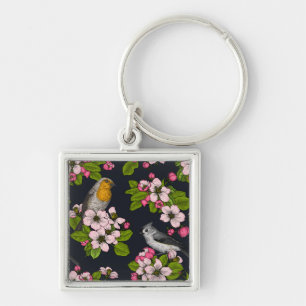 Vögel und Blüten auf schwarz Schlüsselanhänger
