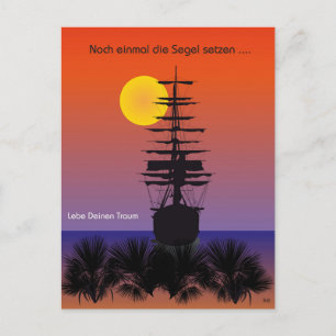 Voilier avec carte postale au lever du soleil