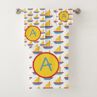 Voilier jouet rouge bleu et jaune Monogramme