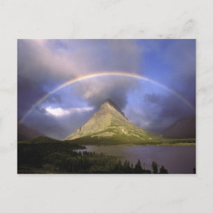 Voller Regenbogen und stürmischer Himmel über Grin Postkarte