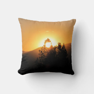 Von einem Sonnenuntergang verbrannt Kissen