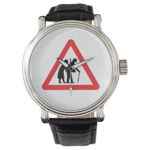 VORSICHT Ältere Menschen - Verkehrszeichen im Ver Armbanduhr