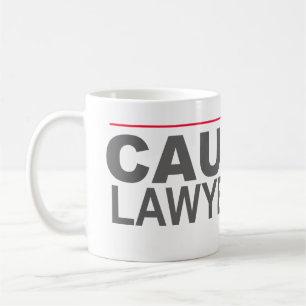 "VORSICHT LAWYERED OBEN" -- KAFFEETASSE