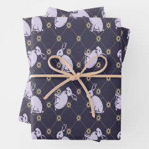 Votre Majesté compte le papier cadeau de lapins