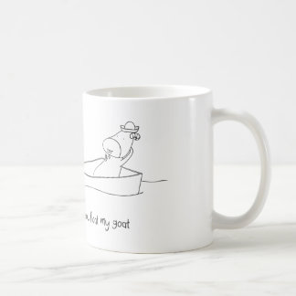 Vous flottez ma tasse de chèvre