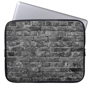 waagerechter Teil der Wand aus schwarz gestrichene Laptopschutzhülle