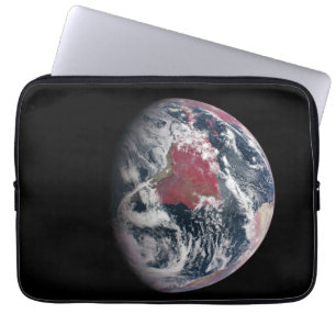 Wachstum der Pflanze auf dem Planeten Erde. Laptopschutzhülle