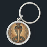 Wadjet – Ägyptische Schlangengöttin´7 Schlüsselanhänger<br><div class="desc">Wadjet ist eine Kobra-Göttin aus der ägyptischen Mythologie und Schutzgöttin der Pharaonen sowie von Unterägypten. Sie steht für Schutz,  Macht und königliche Autorität.</div>