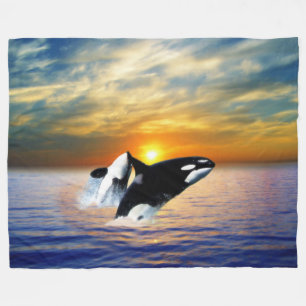 Wale am Sonnenuntergang Fleecedecke