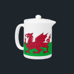 Wales Flag Teapot<br><div class="desc">Fügen Sie Ihrer Teezeit eine Touch walisischer Stolz hinzu, mit diesem charmanten Teekessel mit der Flagge von Wales! Die Teekanne ist mehr als nur eine funktionale Kücheneinrichtung, sie ist eine Feier des walisischen Erbes und der walisischen Kultur. Das kühne Design zeigt stolz den ikonischen roten Drachen auf einem grünen und...</div>