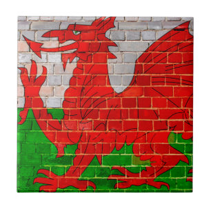 Wales-Flagge auf einer Backsteinmauer Fliese