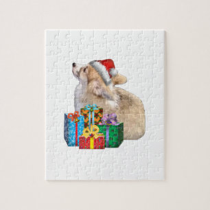 Walisercorgi-Welpe mit Weihnachtsmannmütze