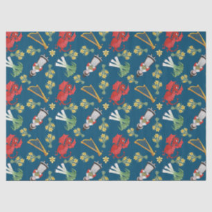 Waliserkostüm und -embleme auf blauem Seidenpapier