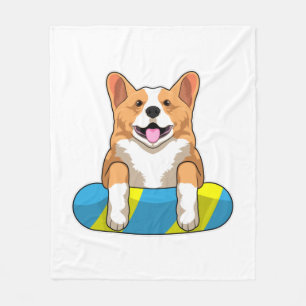 Walisischer Corgi im Schwimmen mit Brett Fleecedecke