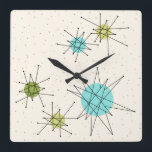 Wall-Uhr am Iconic Atomic Sternexplosion Square Quadratische Wanduhr<br><div class="desc">Dieses Ikonische Atomic Sternexplosion Square Acrylic Wall Clock (Großaufdruck) Muster verfügt über die ikonischen atomaren Sternexplosionen. Das ist richtig! Die alte Schule, der cremefarbene Hintergrund mit goldenen Fesseln ist der perfekte Hintergrund für die lebendigen türkisfarbenen, sanften Sellerie und die kitschigen Birnen grünen Kreise. Die Farbflecken sind sporadisch in verschiedenen Größen...</div>