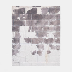Wand aus weißem und braunem Beton Fleecedecke