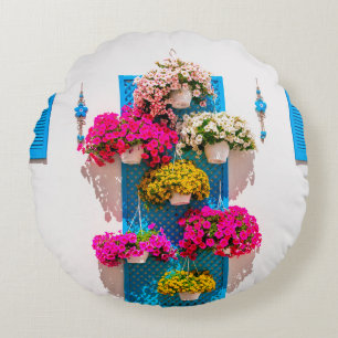 Wanddekoration mit Blumen im ethnischen Stil. Gart Rundes Kissen