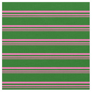 Warmes rosa und dunkelgrünes Muster Stoff