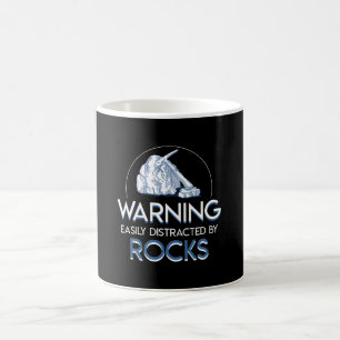 Warnen des leicht abgelenkten Geologie-Felsens Kaffeetasse