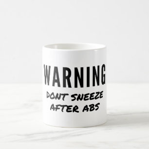 Warnung nach Abs-Workout nicht niesen Kaffeetasse