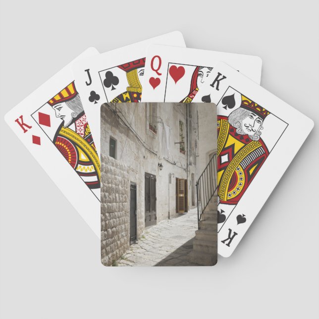 Wäscherei, die hängt, um in einer Gasse in Italien Spielkarten (Rückseite)