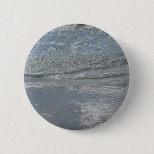 Wasser, das am Strand leckt, abstrakte Fotografie Button