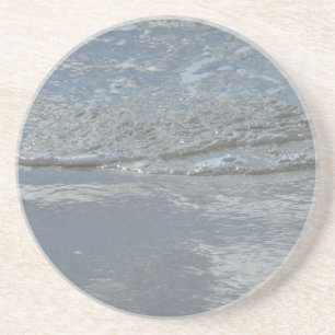 Wasser, das am Strand leckt, abstrakte Fotografie Untersetzer