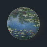 Wasserlilien von Claude Monet, Vintage Blume Button<br><div class="desc">Water Lilies (1906) von Claude Monet ist ein Vintager Impressionismus Kunstlandschaft Blumen Gemälde. Es ist eine von vielen Variationen von Wasserliliengemälden, die Monet in seinem Blumengarten in Giverny, Frankreich, gemalt hat. Wasserlilie Blume in einem Teich der Frühjahrszeit. Über den Künstler: Claude Monet (1840-1926) war Gründer der französischen impressionistischen Malerei, wobei...</div>