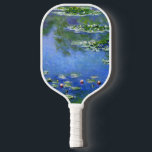 Wasserlilien von Claude Monet, Vintage Kunst Pickleball Schläger<br><div class="desc">Wasserlilien von Claude Monet sind ein Vintager Impressionismus, ein Kunstmalerei mit Wasserlilien in einem Teich im Garten von Monet auf seiner Zuhause in Giverny, Frankreich. Ein sonniger Frühlingstag oder Sommertag mit einem strahlend blauen Himmel im Teich. Claude Monet malt gerne "en plein air" oder "im Freien". Eine Serie von über...</div>
