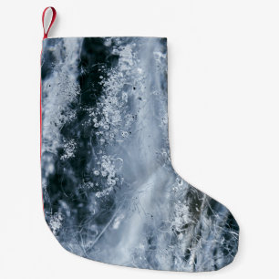 Wasserspritze auf weißem Grund Kleiner Weihnachtsstrumpf