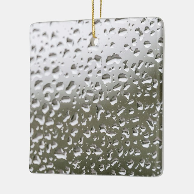 Wassertropfen auf Glas, Regenfälle auf Glas Keramikornament (Links)
