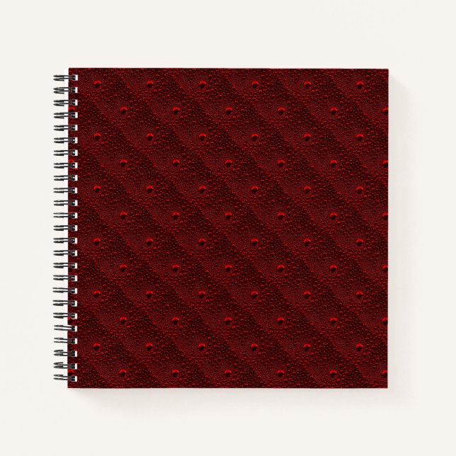 Wassertropfen auf Krimsonmetall Notizbuch (Vorderseite)