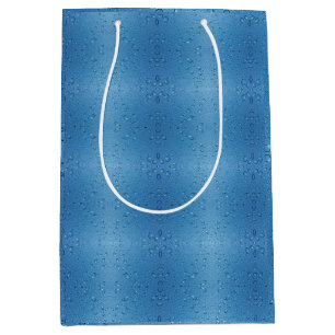 Wassertropfen gegen blauen Himmel Mittlere Geschenktüte