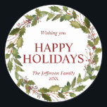 Watercolor Holly Verlasse Wreath Christmas Holiday Runder Aufkleber<br><div class="desc">Liebliche festliche Hand bemalt Aquarellkranz heilig in Grün und tiefroten Beerenfarben. Leicht zu bearbeiten Text. FREUEN SIE SICH AUF URLAUB ODER FREUNDLICHE WEIHNACHTEN & GLÜCKLICHES NEUES JAHR. Macht tolle Karten,  die ihr während der Ferienzeit an Familie und Freunde schicken könnt - toller Sake!</div>