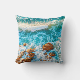 Waves on a rocky beach at sunset. Aerial viewbeach Kissen