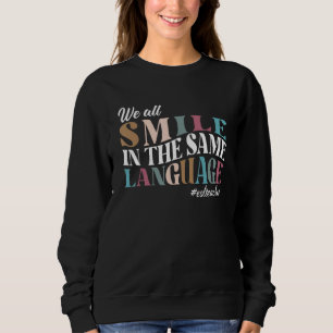 We all smile in the Same Language ESL Teachers Sweatshirt